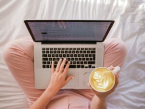 laptop with a mug of coffee